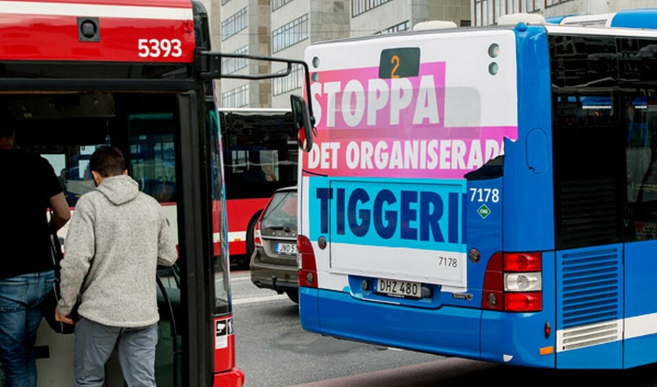 Sverigedemokraternas valaffisch på en blå SL-buss i centrala Stockholm inför valet 2014. Foto: Johan Nilsson / TT-Bild