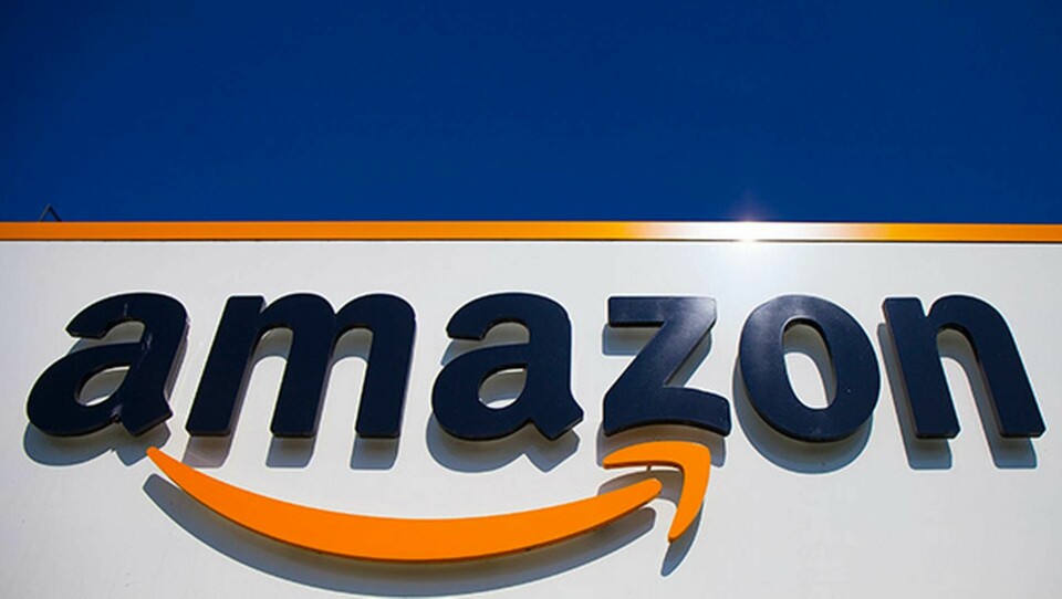 En före detta anställda stämmer genom fackförbundet Unionen den amerikanska näthandelsgiganten Amazon. Foto: Michel Spingler/AP/TT
